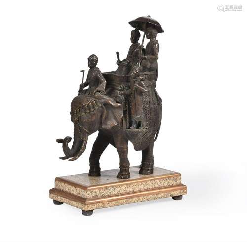 An Indian bronze model of an elephant with riders and