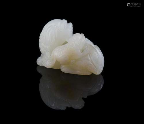 A Chinese white jade carving of a Buddhistic lion and