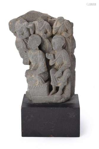 A Gandhara grey schist carved stone frieze fragment