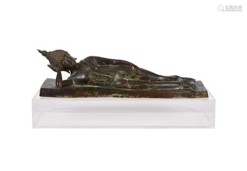 A Sukotai style bronze figure of the reclining Buddha