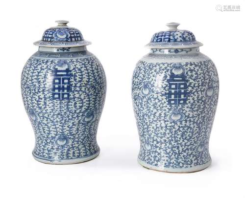 A pair of Chinese blue and white 'marriage' vases and