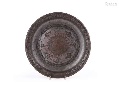 An engraved tinned copper basin with owner's