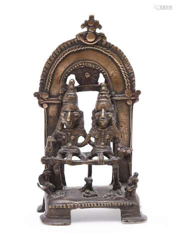 A tribal bronze shrine depicting Siva and Parvati