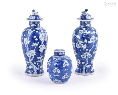 A pair of Chinese blue and white vases and covers