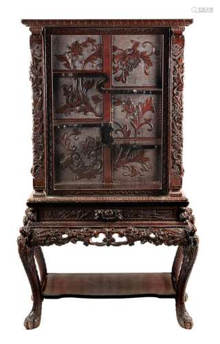 A Chinese carved hardwood cabinet