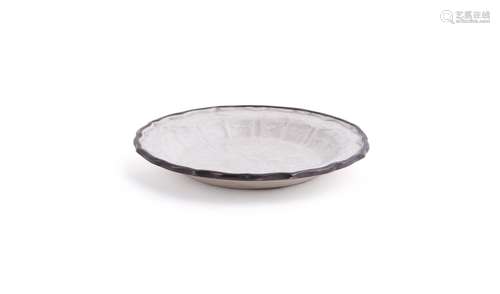 A small Chinese white glazed lobed dish