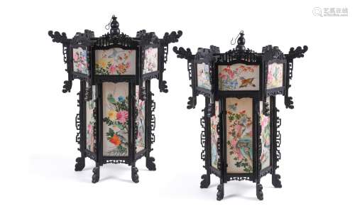 A large pair of Chinese wood and painted silk hanging