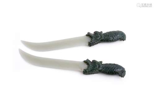 A pair of jadeite models of daggers