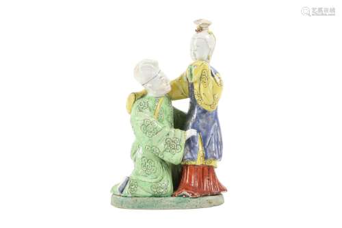 A CHINESE ENAMELLED BISCUIT 'LOVERS' GROUP.
