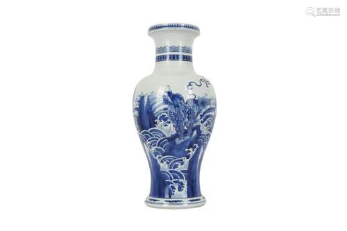 A CHINESE BLUE AND WHITE 'QILIN ON ROCKS' BALUSTER...