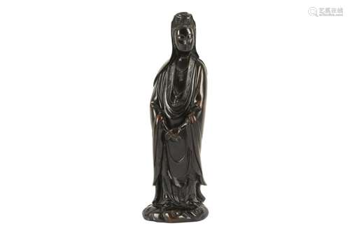 A CHINESE BRONZE STANDING FIGURE OF GUANYIN.