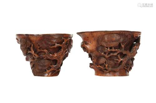 A PAIR OF CHINESE CARVED BAMBOO 'PINE TREE' LIBATI...