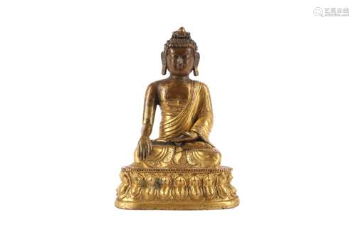 A CHINESE GILT-BRONZE FIGURE OF A BUDDHA SAKYAMUNI.