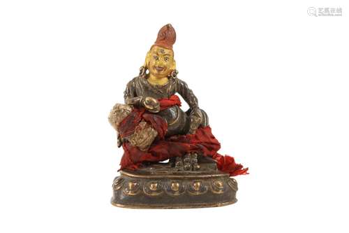 A TIBETAN BRONZE KUBERA.