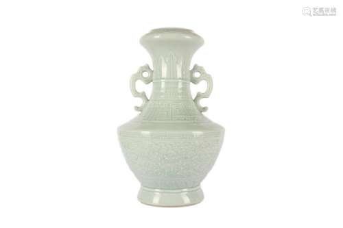 A CHINESE PALE CELADON-GLAZED 'PEONIES' VASE.