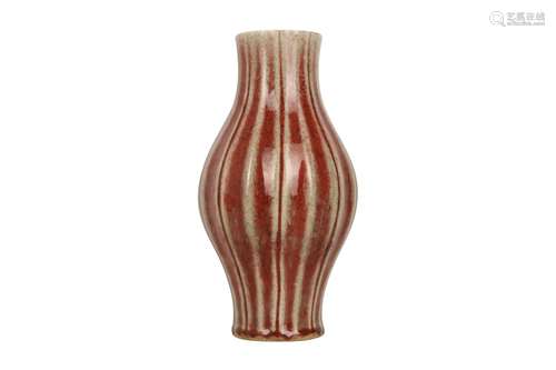 A CHINESE PEACH BLOOM-GLAZED VASE.