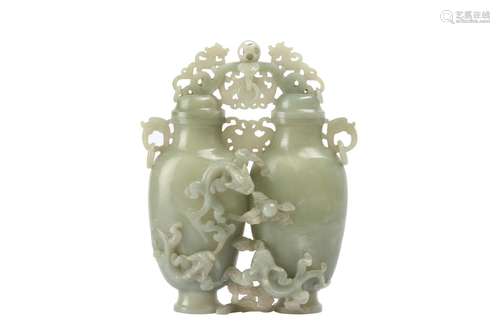 A CHINESE PALE CELADON JADE DOUBLE 'CHILONG' VASE.