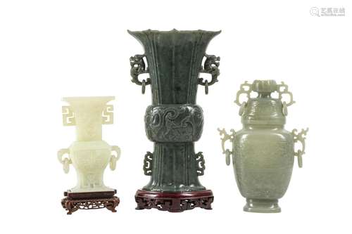 THREE CHINESE ORNATELY CARVED JADE VASES.