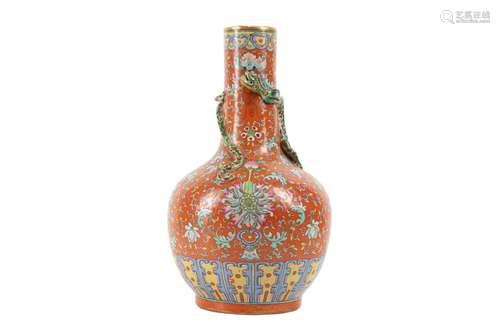 A CHINESE FAMILLE ROSE CORAL-GROUND VASE.