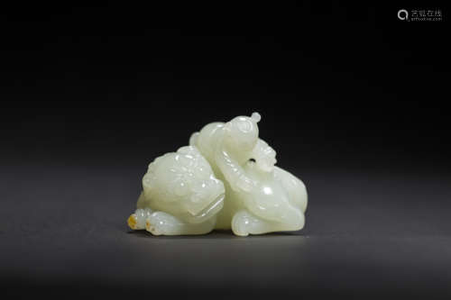 Jade Ornament in Child plays with Lion form from Qing