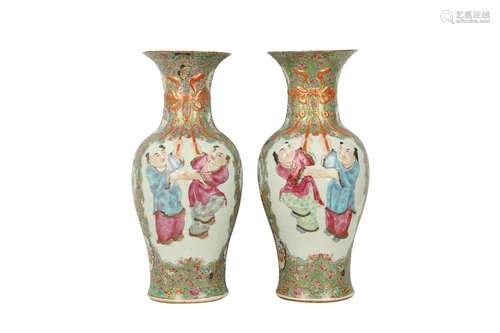 A PAIR OF LARGE CHINESE FAMILLE ROSE MOULDED VASES.