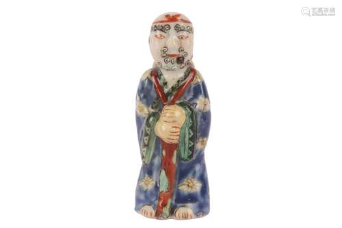 A CHINESE BISCUIT 'LI TIEGUAI' SNUFF BOTTLE.