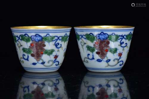 PAIR OF DOUCAI GILT GRAPE VINES PORCELAIN CUPS