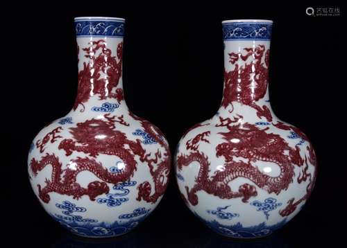 PAIR BLUE AND UNDERGLAZE RED DRAGON CELESTIAL VASE