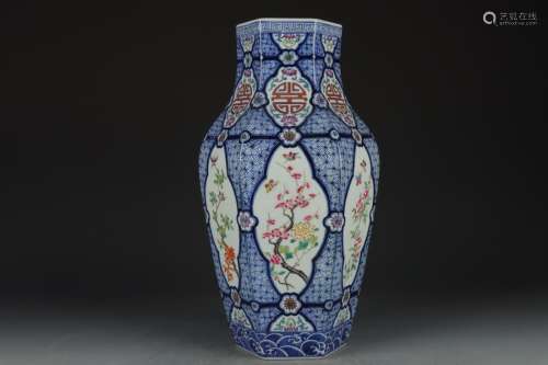 BLUE AND WHITE OPEN FACE FLORAL HEXAGONAL VASE
