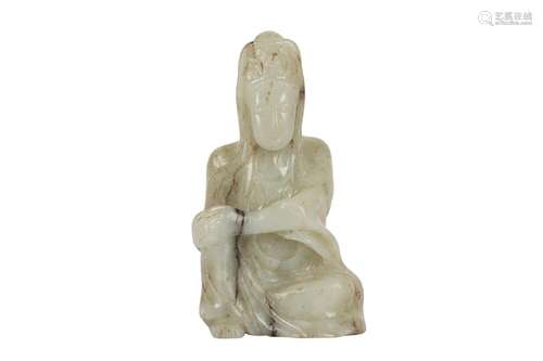 A CHINESE PALE CELADON JADE FIGURE OF GUANYIN.