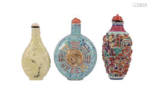 THREE CHINESE BISCUIT SNUFF BOTTLES.