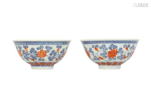 A PAIR OF CHINESE IRON-RED AND UNDERGLAZE BLUE 'LOTUS S...