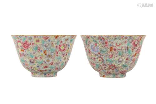 A PAIR OF CHINESE FAMILLE ROSE 'MILLEFLEUR' CUPS.