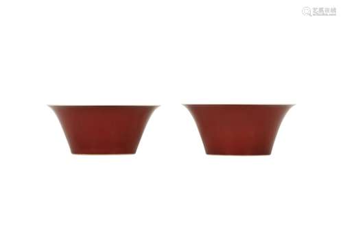 A PAIR OF CHINESE COPPER RED-GLAZED BOWLS.