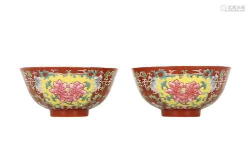 A PAIR OF CHINESE CORAL-GROUND FAMILLE ROSE BOWLS.