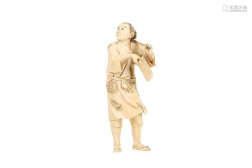 λ A JAPANESE IVORY OKIMONO OF A MAN.