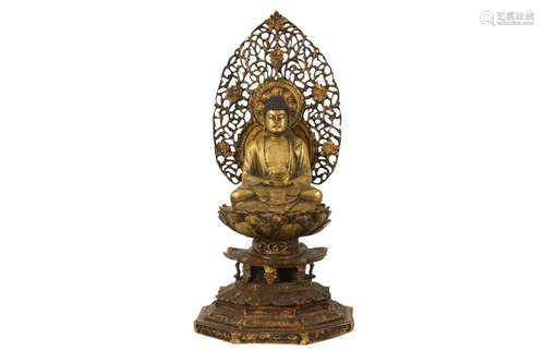 A JAPANESE GILT BRONZE AMIDA BUDDHA.