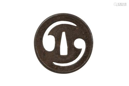 AN IRON SUKASHI TSUBA.