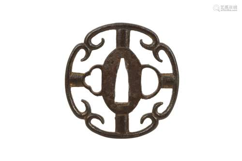 AN IRON SUKASHI TSUBA.