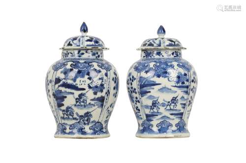 A PAIR OF CHINESE BLUE AND WHITE BALUSTER VASES AND COVERS.