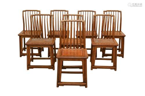 A SET OF EIGHT CHINESE WOOD CHAIRS.