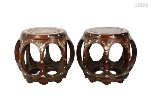 A PAIR OF HARDWOOD MOTHER OF PEARL-INLAID BARREL STOOLS.