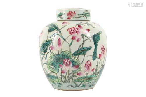 A CHINESE FAMILLE ROSE 'LOTUS POND' JAR AND COVER.