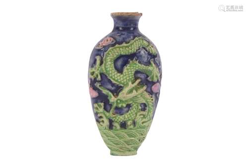 A CHINESE BISCUIT 'DRAGON' SNUFF BOTTLE.