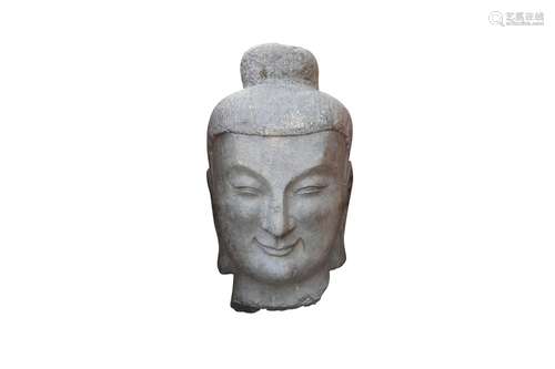 A CHINESE STONE HEAD OF A BUDDHA.