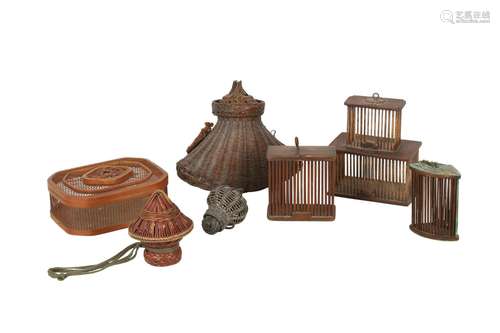 A COLLECTION OF SEVEN WOVEN AND CARVED WOOD CRICKET CAGES.