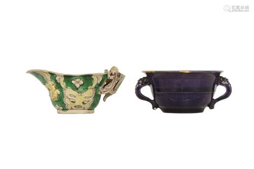 A CHINESE FAMILLE VERTE POURING VESSEL AND AN AUBERGINE-GLAZ...