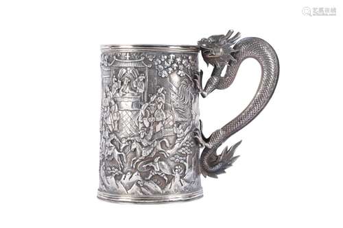 A CHINESE SILVER TANKARD.