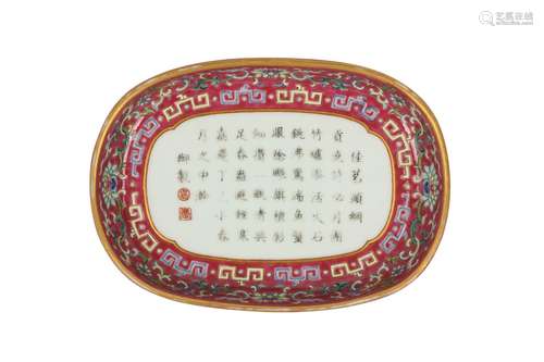 A CHINESE FAMILLE ROSE OVAL RUBY-GROUND TRAY.