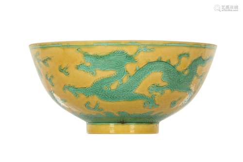 A CHINESE YELLOW-GROUND GREEN-ENAMELLED 'DRAGON' B...